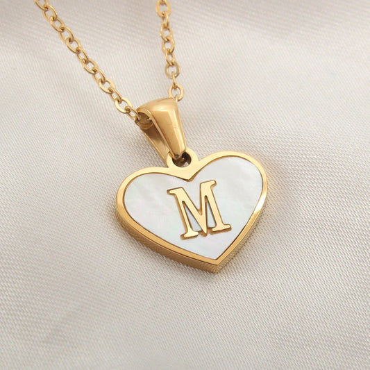 Mandotos 26-letter heart-shaped necklace with white shell accents, personalized love charm, stylish clavicle chain for women jewelry.