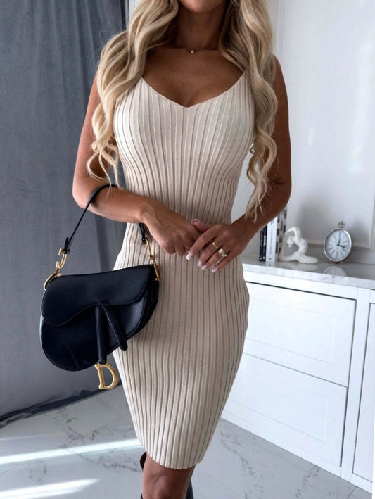 Mandotos 2-piece women's suit with solid stripe long-sleeved top and tight suspender skirt, perfect for autumn winter fashion.