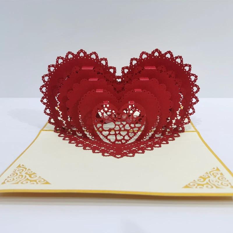 Mandotos 3D laser-cut engagement card with red heart and romantic silhouette, featuring intricate heart and love-themed design.