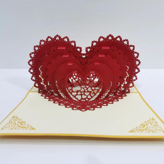 Mandotos 3D laser-cut engagement card with red heart and romantic silhouette, featuring intricate heart and love-themed design.