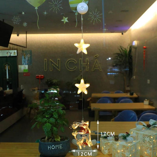 Mandotos Christmas 3-piece LED star hanging lights with suction cups, battery-powered home decor lighting.