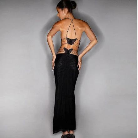 Mandotos floral print halter dress with butterfly back and spaghetti straps, perfect for summer or casual outings.