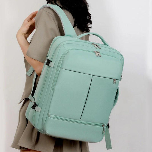 Mandotos large capacity backpack with multiple pockets and space for a laptop, ideal for travel and daily use.