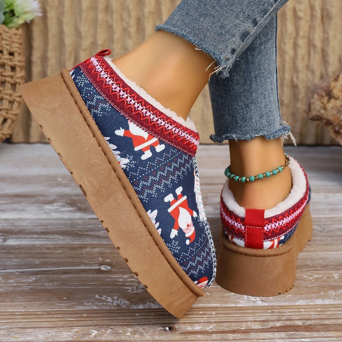 Mandotos navy Christmas cartoon print plush-lined slip-on ankle boots for women, cozy indoor home shoes with festive design.