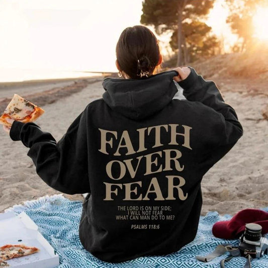 Unisex brown Christian hoodie by MANDOTOS featuring the Bible verse Psalms 118:6 "Faith Over Fear" printed on the front.