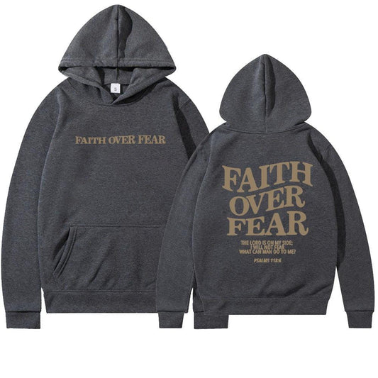 Unisex brown Christian hoodie by Mandotos featuring a Bible verse from Psalms 118:6 with "Faith Over Fear" printed on the front.
