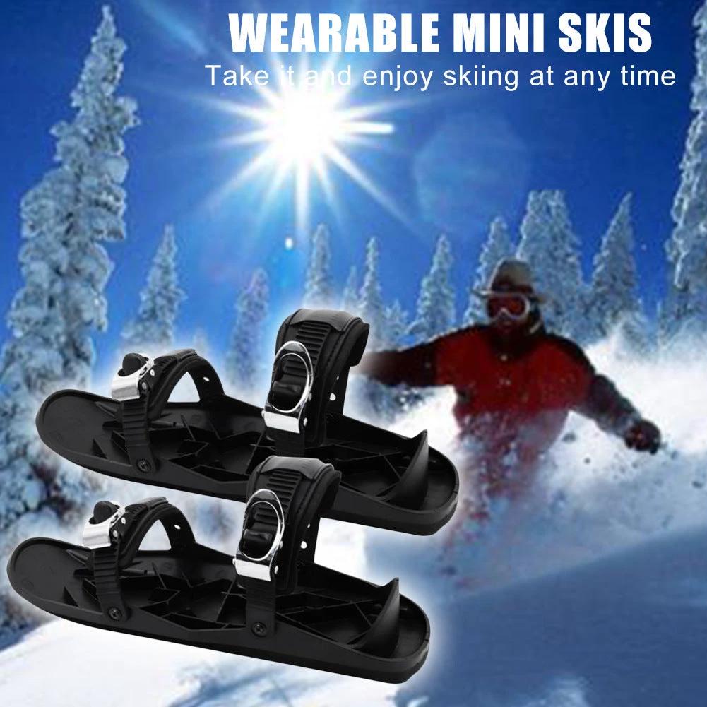 Mandotos Mini Ski Skates, portable adjustable short skiboard for snow, shown with snowy background and compact design.