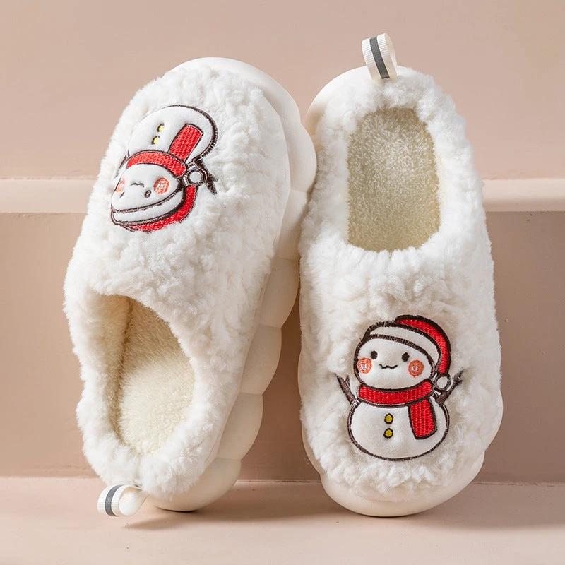 Pair of MANDOTOS Snowman slippers with plush winter fabric and anti-slip soles, designed for cozy home wear for couples.