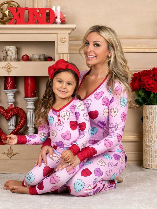 Matching Valentine's Day love print pajamas for parent and child by MANDOTOS, featuring cozy, festive sleepwear with love-themed designs.