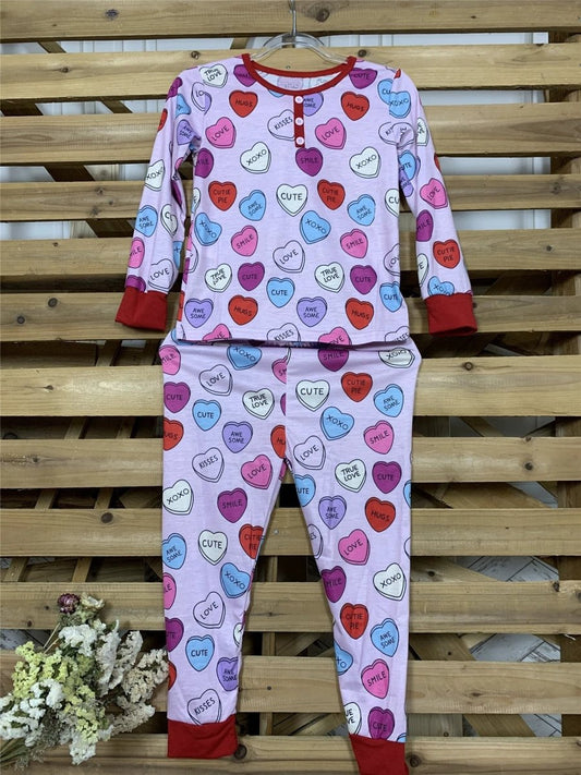 Matching Valentine's Day love print pajamas for parent and child by MANDOTOS, featuring cozy, festive sleepwear sets.