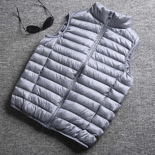 Mandotos winter white duck down ultralight sleeveless vest with a sleek design, providing warmth and effortless style.