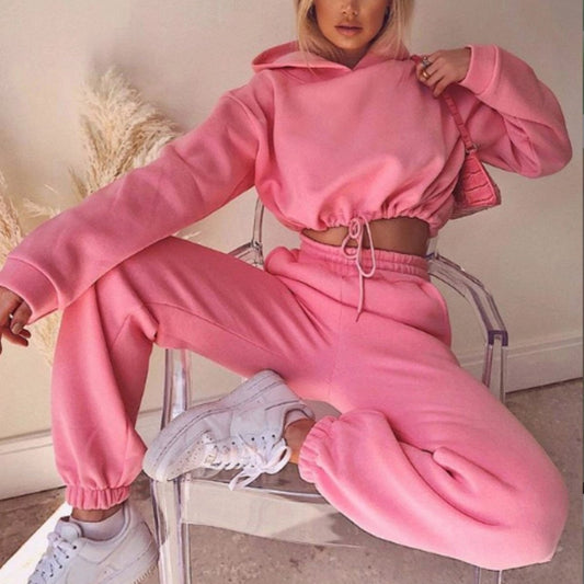 Women's 2-piece jogging suit by MANDOTOS featuring a sexy long sleeve hoodie and matching joggers, ideal for active wear.