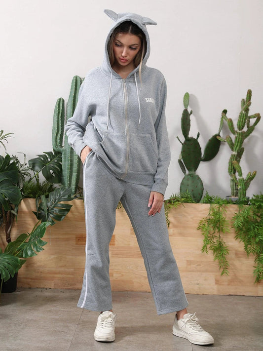 Women's long-sleeved hoodie set by MANDOTOS, featuring a comfortable top and matching pants in soft fabric.