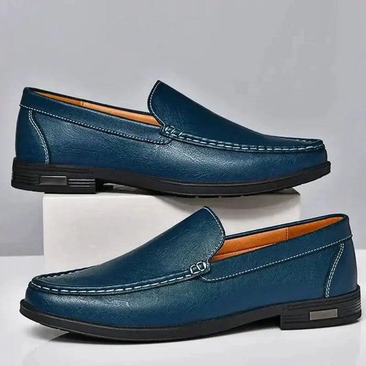 Mandotos Eco-Chic leather loafers featuring classic slip-on design, smooth leather upper, and stylish stitching detail.