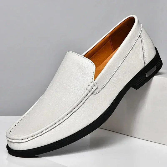 Mandotos Eco-Chic Leather Loafers featuring classic design, brown leather upper, and comfortable slip-on style.