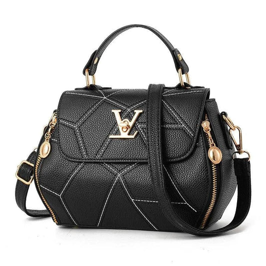 Elegant leather tote bag by MANDOTOS featuring a sleek design, sturdy handles, and spacious interior for everyday use.