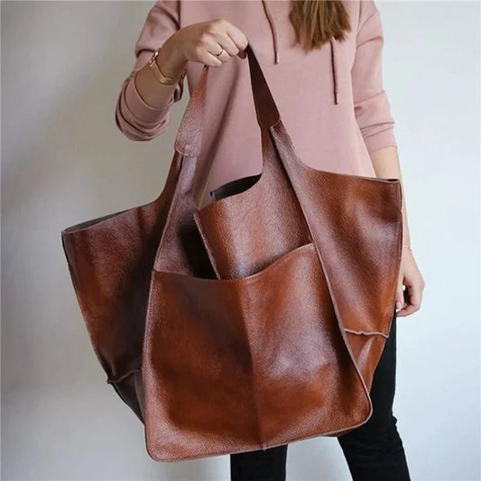 Elegant women's tote bag by MANDOTOS, featuring a stylish design with spacious interior and durable handles.