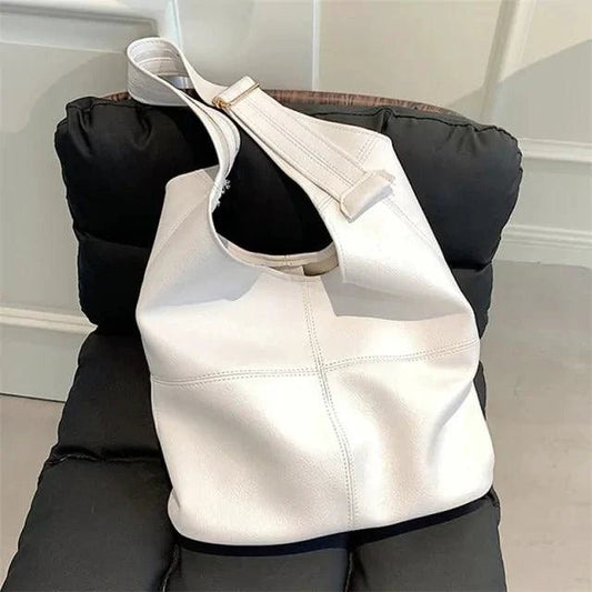 Elegant women's tote bag by MANDOTOS, featuring a stylish design with sturdy handles and spacious interior.