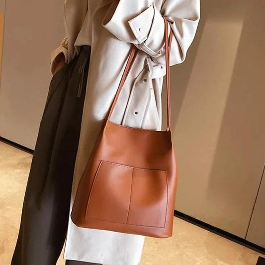 Elegant women's tote bag by MANDOTOS, featuring a stylish design with sturdy handles and spacious interior.