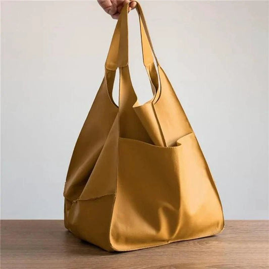 Elegant women's tote bag by MANDOTOS, showcasing a stylish design with spacious interior and durable handles.
