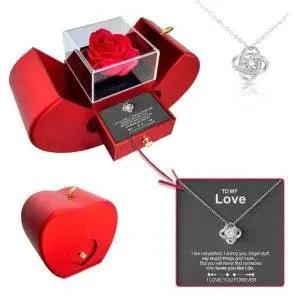 Mandotos red apple-shaped jewelry box with artificial rose, ideal for necklaces, perfect for gift-giving on special occasions.