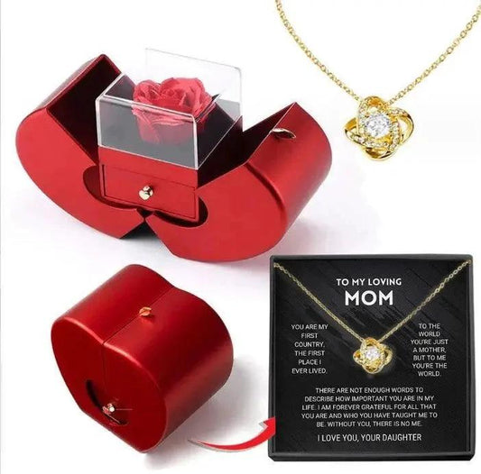 Mandotos red apple-shaped jewelry box with artificial rose and necklace, perfect for Christmas, Mother's Day, and Valentine's Day gifts.