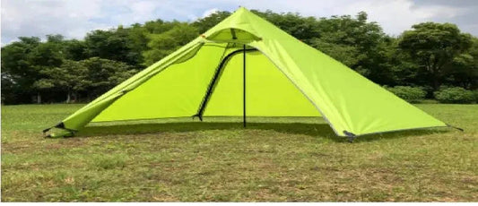 Mandotos Featherlight Pyramid Camp Shelter set up outdoors, showcasing lightweight, durable camping shelter with open sides and rain cover