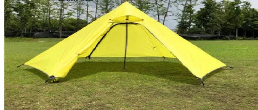 Mandotos Featherlight Pyramid Camp Shelter set up outdoors, showcasing its lightweight, durable design suitable for camping adventures.