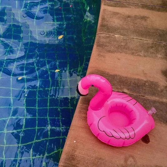 Mandotos flamingo-themed pool party cup holders, colorful and fun accessories to keep drinks secure during summer celebrations.