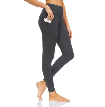Mandotos FlexiForm high-waist fitness leggings displayed on a model, showcasing their stretchy, supportive fabric and sleek design.