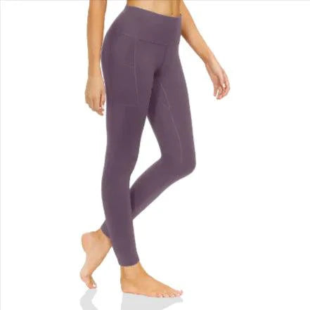 Mandotos FlexiForm high-waist fitness leggings shown on a model, featuring a snug fit and stretchy fabric for workout comfort.