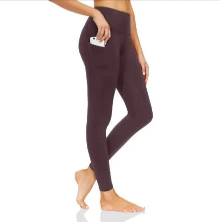 Mandotos FlexiForm high-waist fitness leggings shown on a model, featuring a snug fit and stretchy fabric for active wear.