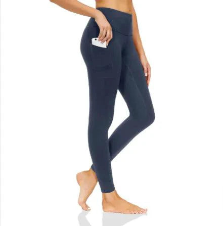Mandotos FlexiForm high-waist fitness leggings shown on a model, featuring a snug fit and stretchy fabric for active wear.