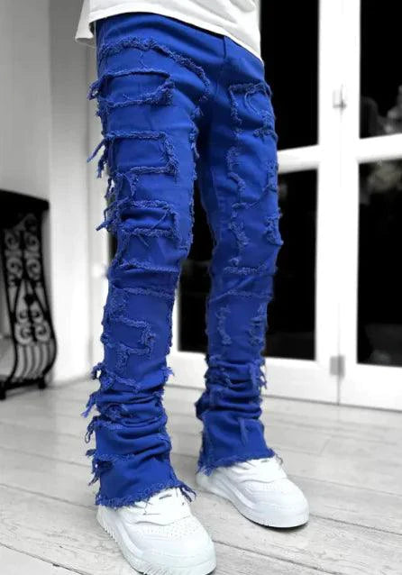 Mandotos FlexiStyle denim jeans featuring classic five-pocket design and slim fit, made from durable blue denim fabric.