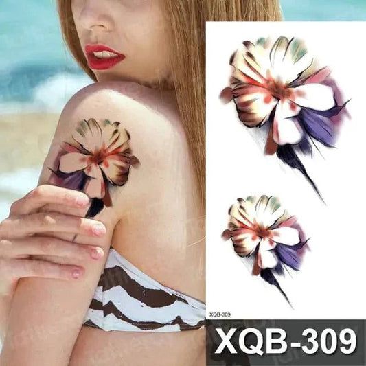 Mandotos Floral Essence Body Art Tattoo featuring intricate floral designs on skin, showcasing detailed, vibrant tattoo artwork.