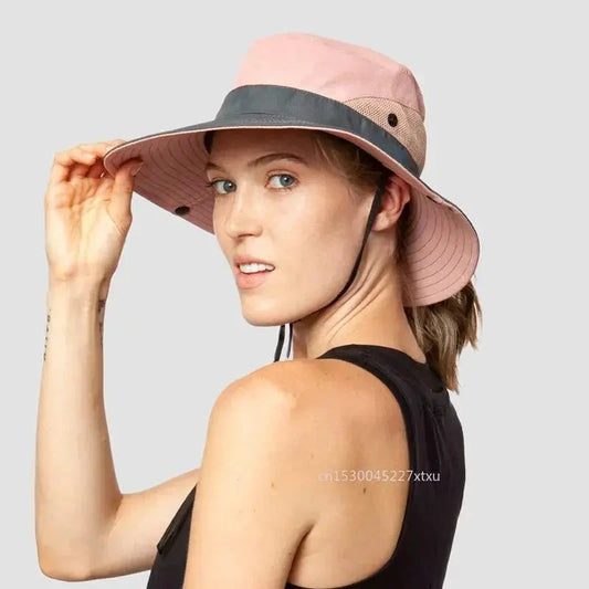 Girls' Ponytail UV Shield Sun Hat by MANDOTOS with wide brim and adjustable strap, offering sun protection for outdoor play.