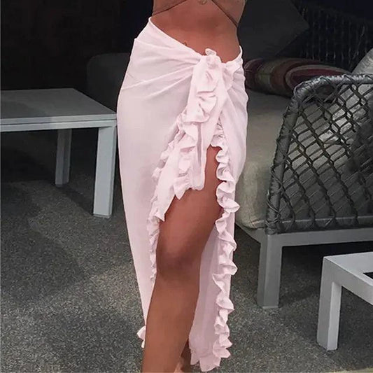 Mandotos GlamourWave chiffon beach wrap draped over a model, showcasing lightweight, elegant summer accessory for sunny days.