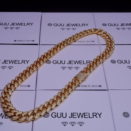 Mandotos Gold Shine Iced Cuban Chain featuring a luxe style upgrade with sparkling iced detailing.