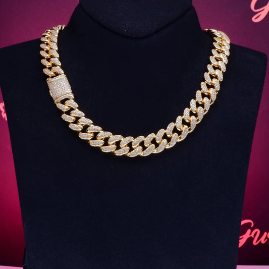 Mandotos Gold Shine Iced Cuban Chain featuring a luxe style upgrade with sparkling iced detailing and a bold, chunky design.