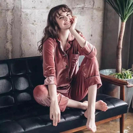 Gold velvet pajamas from MANDOTOS featuring a soft, luxurious fabric and relaxed fit, perfect for cozy loungewear.