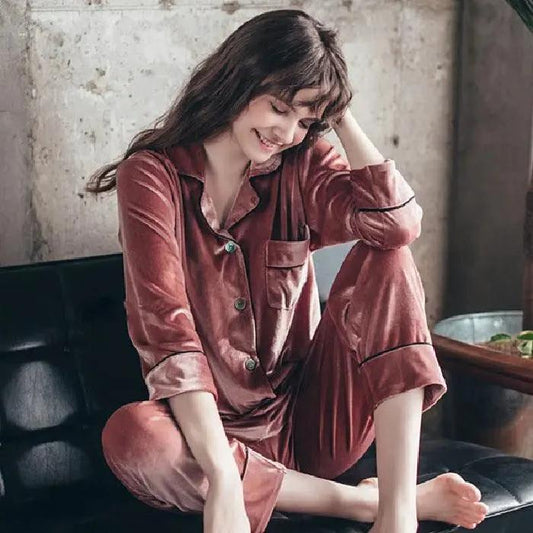 Gold velvet pajamas from MANDOTOS, featuring a luxurious soft fabric and relaxed fit, ideal for comfortable loungewear.