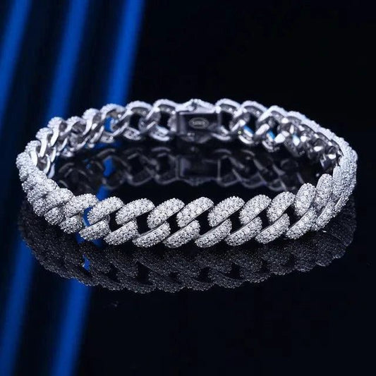 18k gold Cuban link bracelet by MANDOTOS, showcasing a shiny, durable gold chain with a secure clasp design.