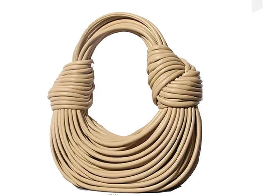 Mandotos gold luxury designer women's handbag featuring handwoven noodle design, rope knots, and silver evening clutch style.