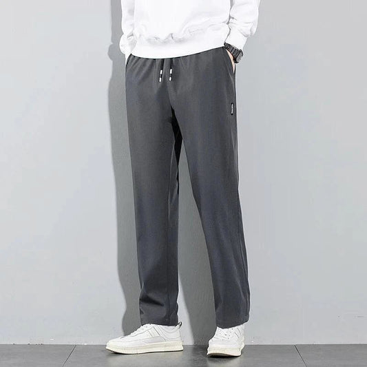 Mandotos Ice Silk men's summer casual pants in black and gray, breathable, elastic, straight-leg sweatpants for outdoor and business wear.