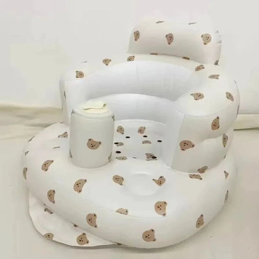 Inflatable baby chair by MANDOTOS designed for dining and bath, with soft, durable material and secure seating for infants.