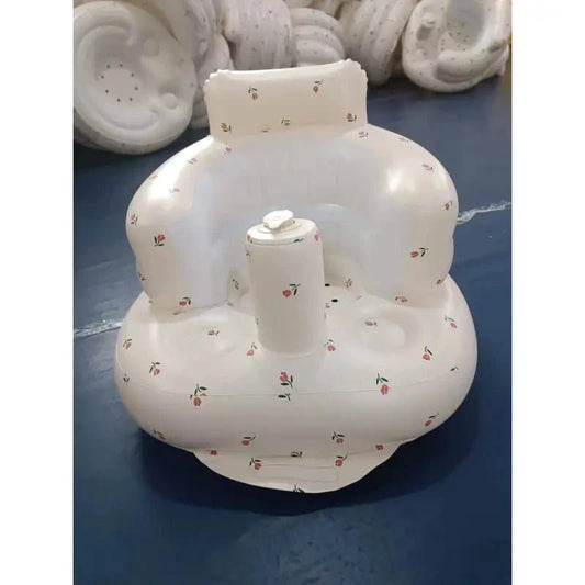 Inflatable baby chair from MANDOTOS designed for dining and bath, featuring a soft cushion and secure sides for comfort and safety.