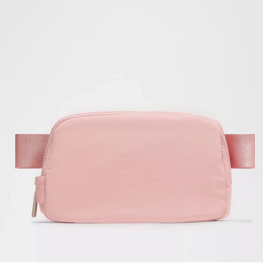 Mandotos International 1L breathable women's fanny pack with adjustable strap, perfect for travel and outdoor activities.