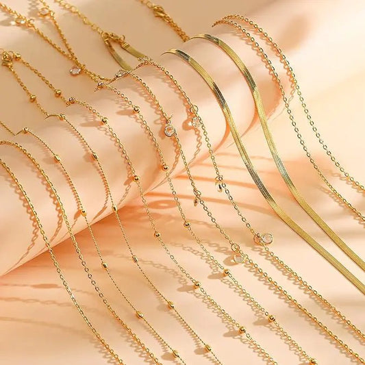 Eight-piece gold-plated waist chain set featuring beaded, sequin, CZ coin designs, adjustable body jewelry from MANDOTOS INTERNATIONAL.