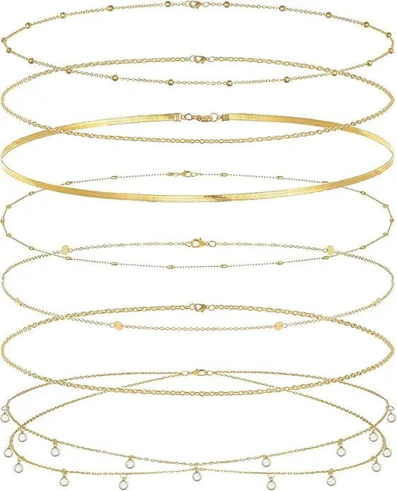 8-piece gold-plated waist chain set with beaded, sequin, and CZ coin designs, adjustable belly belt jewelry by MANDOTOS INTERNATIONAL.