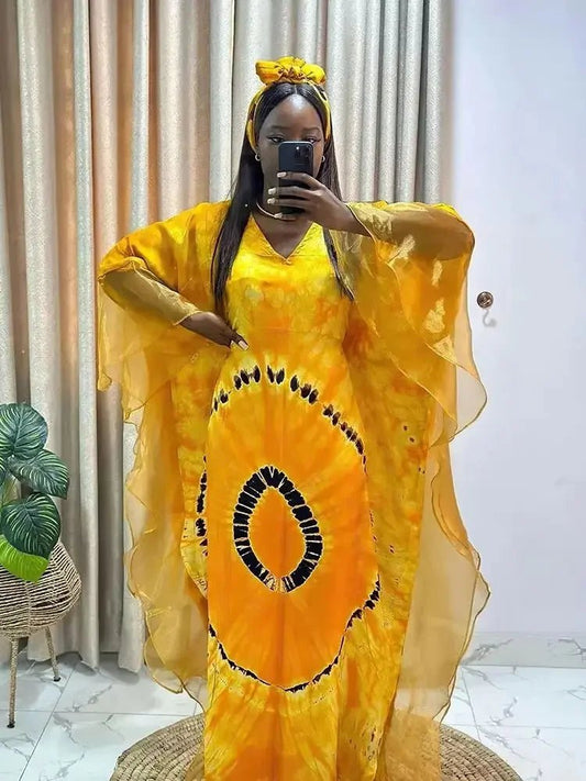 African Dashiki Ankara maxi dress for women, traditional long dress with vibrant patterns by MANDOTOS INTERNATIONAL.